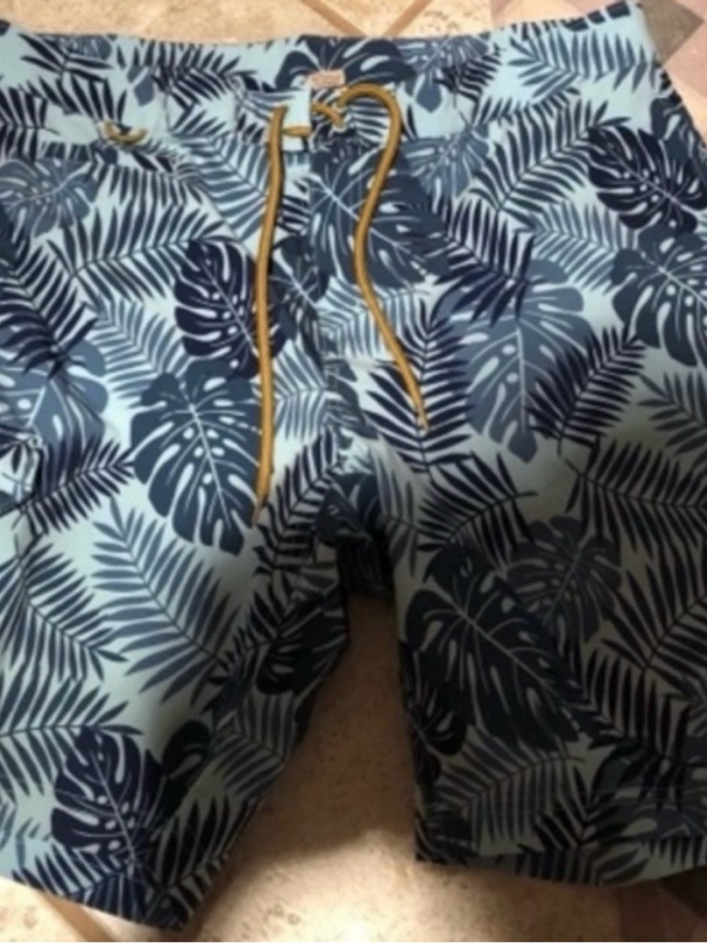 Duluth Trading Co Light Blue Swim Shorts with Navy Leaf Print